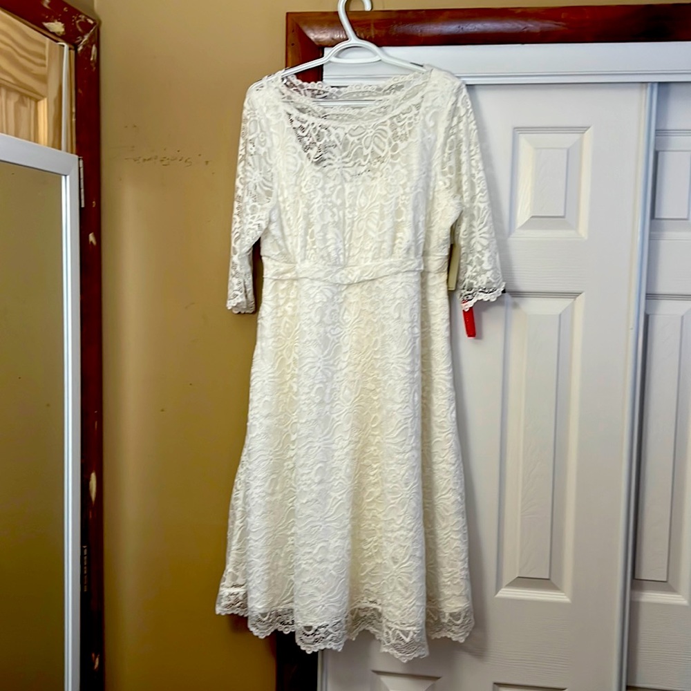 New with tags Kiyonna wedding dress. Ordered on line and it didn’t fit.